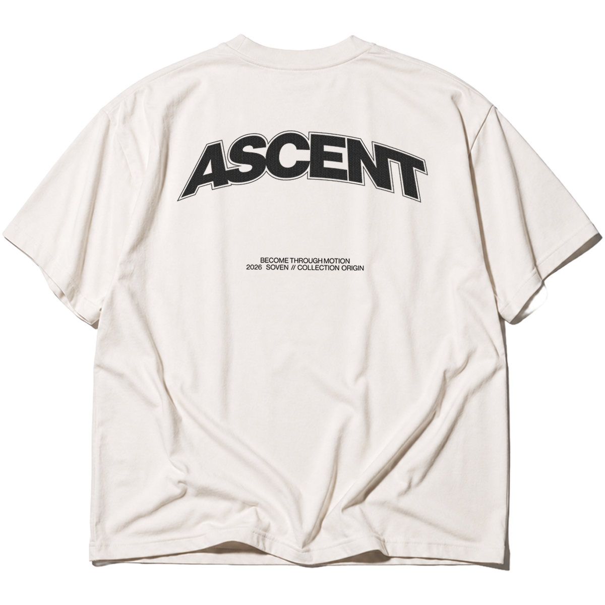 Back view of the SOVEN ASCENT oversized heavyweight cotton T-shirt in light from the ORIGIN collection featuring a minimalist back graphic.
